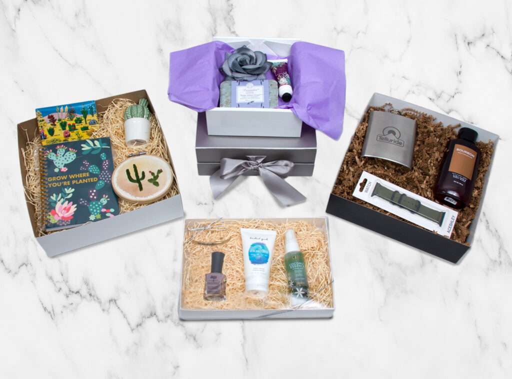 Variety of gift boxes with curated gift items inside