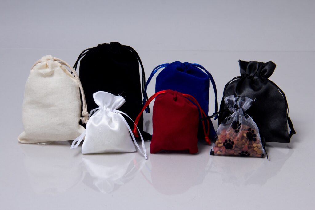 A collection of drawstring pouch bags in different colors and styles